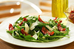 rocket and parmesan shavings and sunblush tomatoes